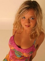 Blonde angel shows off her firm big tits and more